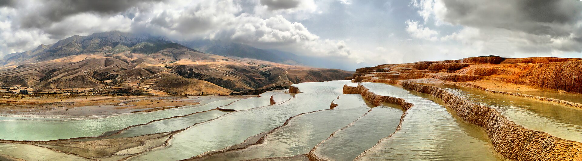 The travertine terraces of Badab-e Surt in Mazandaran, formed by mineral springs over millennia.