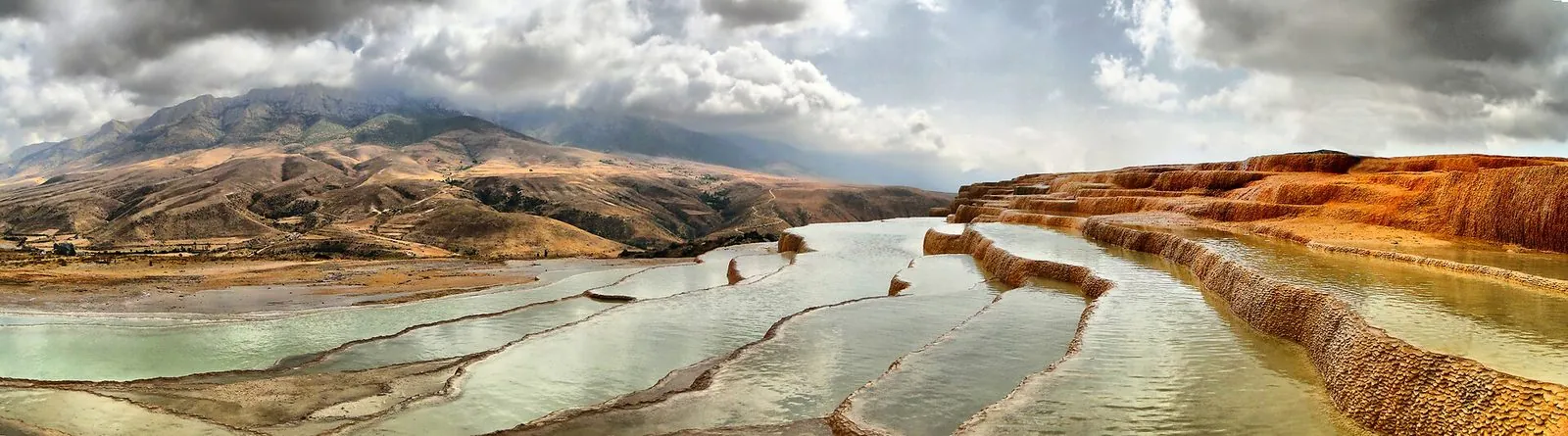 The travertine terraces of Badab-e Surt in Mazandaran, formed by mineral springs over millennia.