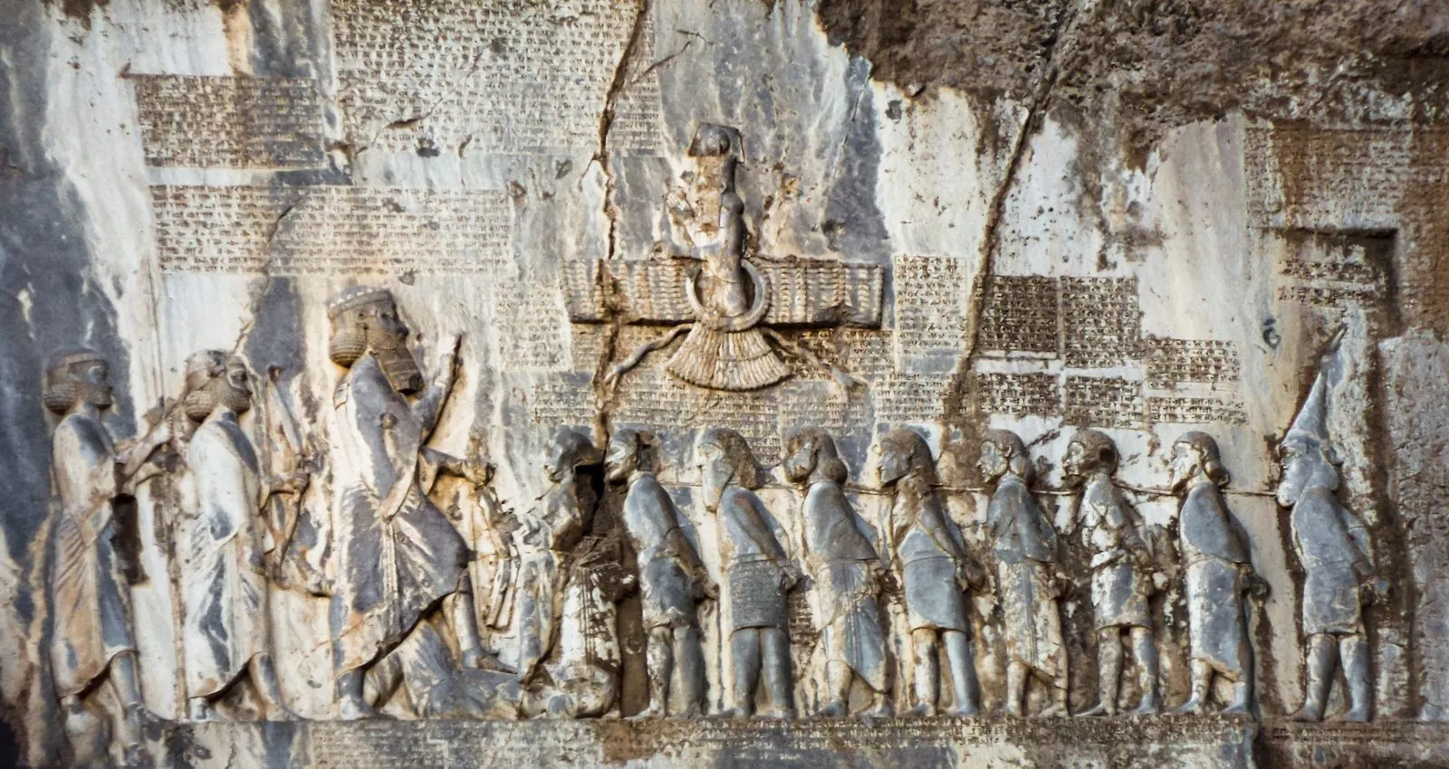 The Bisotun inscription of Darius the Great (c. 520 BCE), carved high above the old Silk Road in Kermanshah.