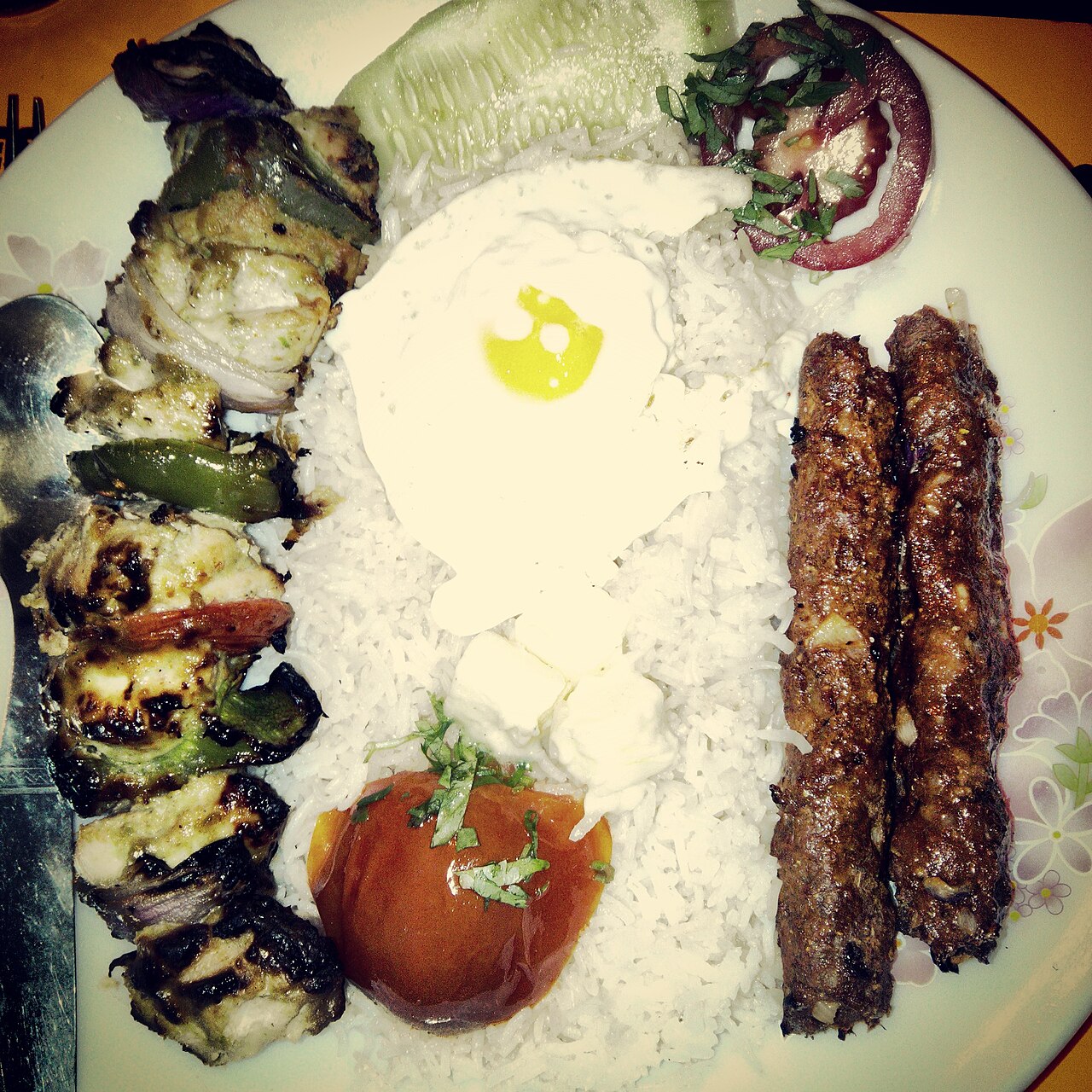 Chelow kabab — saffron rice and grilled lamb, Iran's de facto national dish.