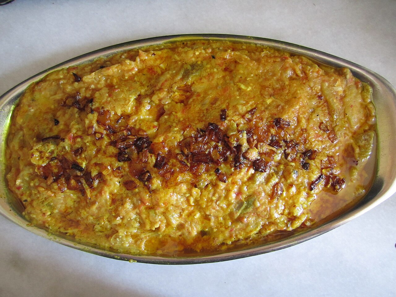 Mirza ghasemi — smoked aubergine, tomato, garlic and egg from the Caspian shore.