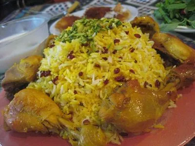 Zereshk-polo — barberry rice with saffron chicken.