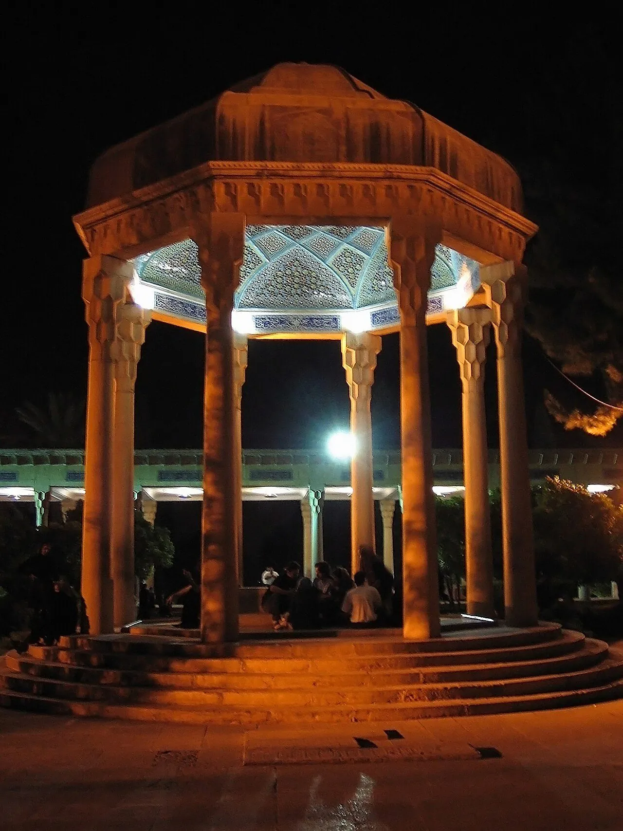 The marble tomb of Hafez beneath its tiled cupola, Shiraz.