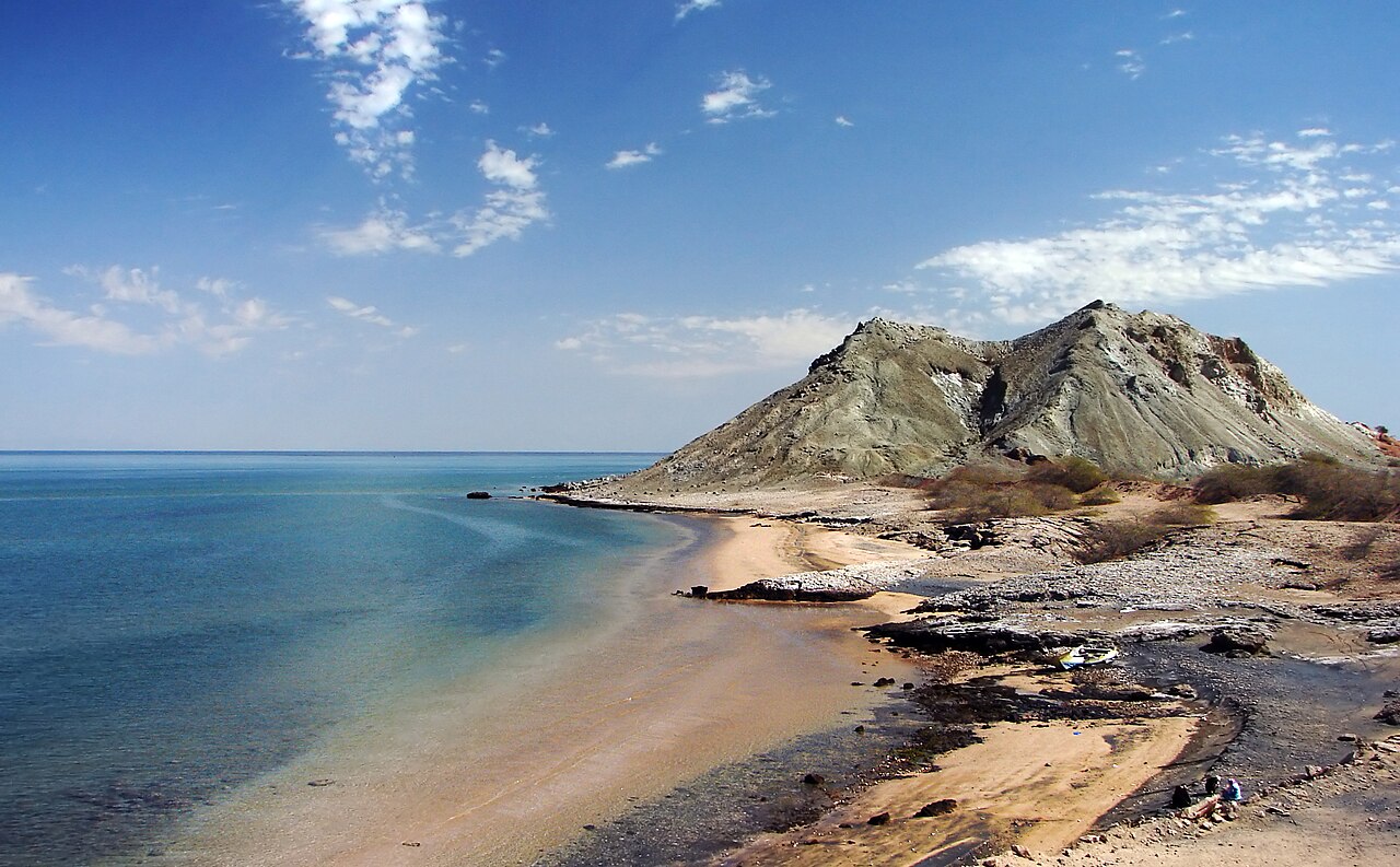 The red ochre cliffs and silica sands of Hormuz Island, on the Persian Gulf.