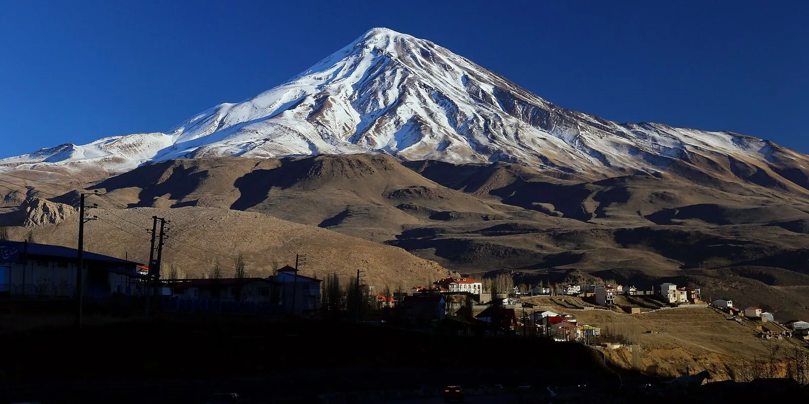 Mount Damavand (5,610 m) seen from Polur in deep winter — the highest peak in the Middle East and a sacred mountain in Persian mythology.