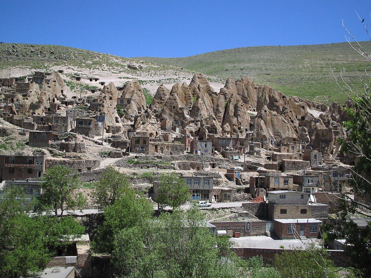 Kandovan — cone-shaped cave dwellings carved into volcanic tuff, still inhabited.