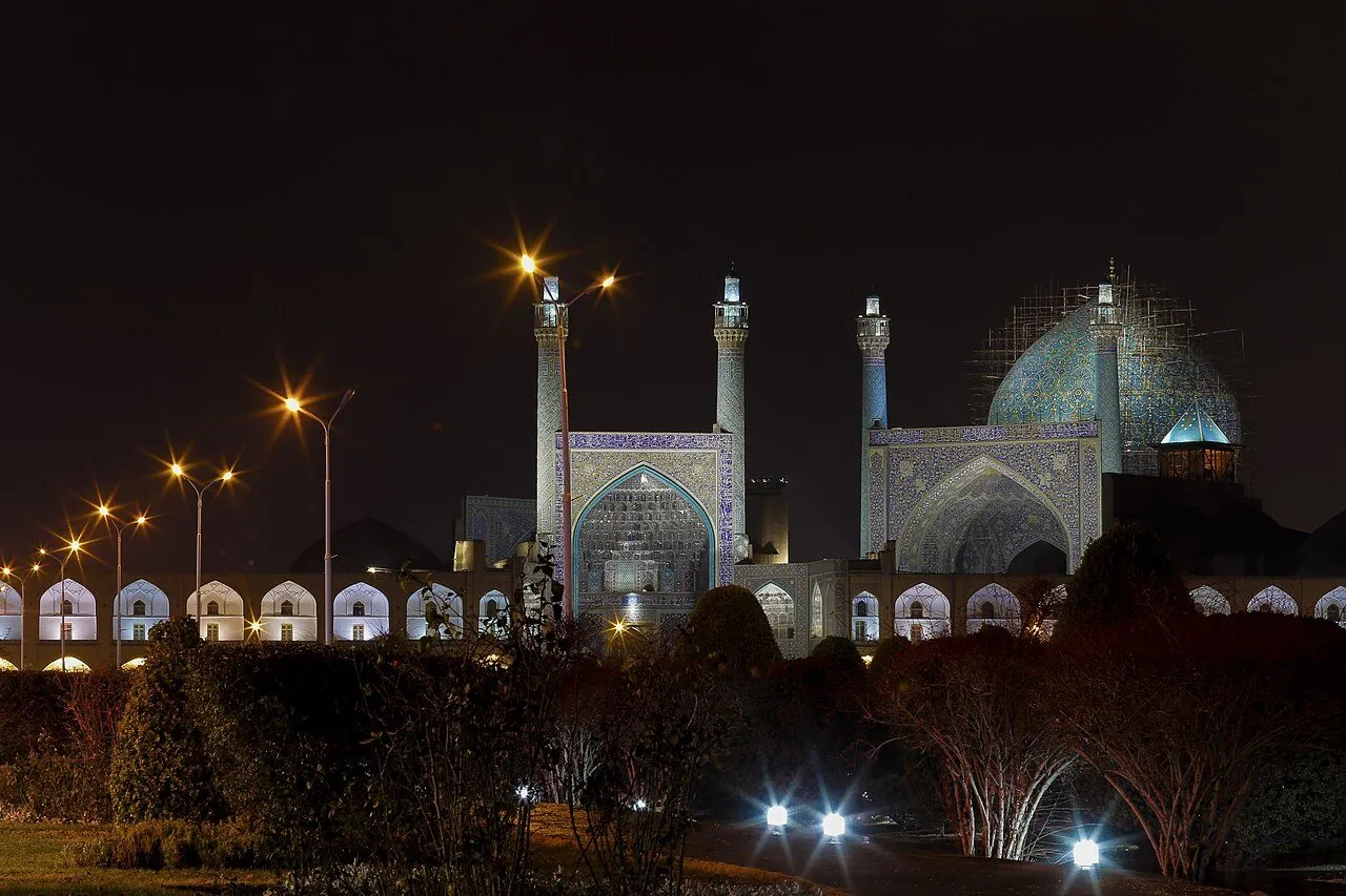 The dome of Sheikh Lotfollah Mosque, Isfahan (1619), whose tiles shift from cream to pink with the light.