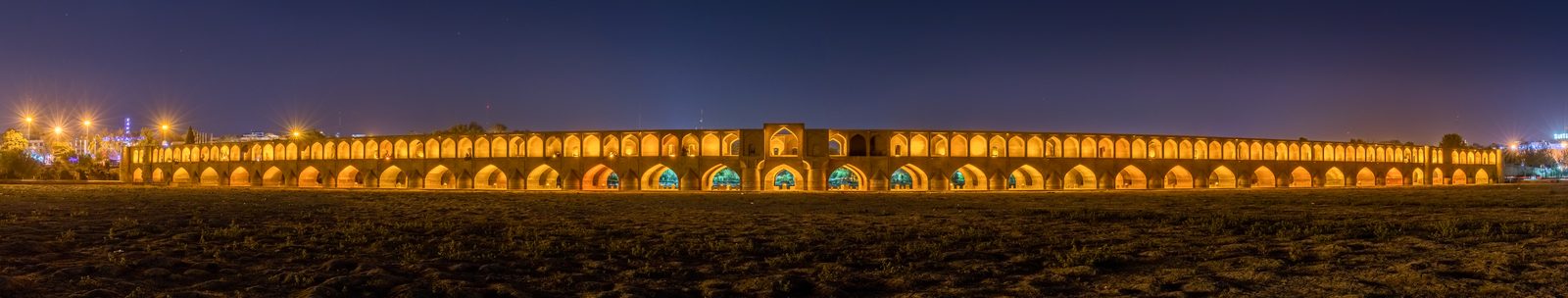 The thirty-three arches of Si-o-se-pol bridge over the Zayandeh River, Isfahan (1602).