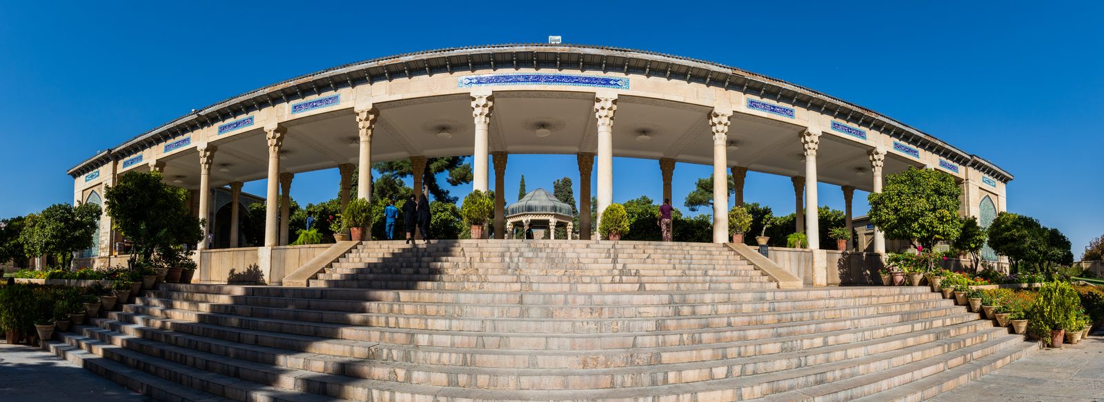 The marble tomb of Hafez beneath its tiled cupola, Shiraz.