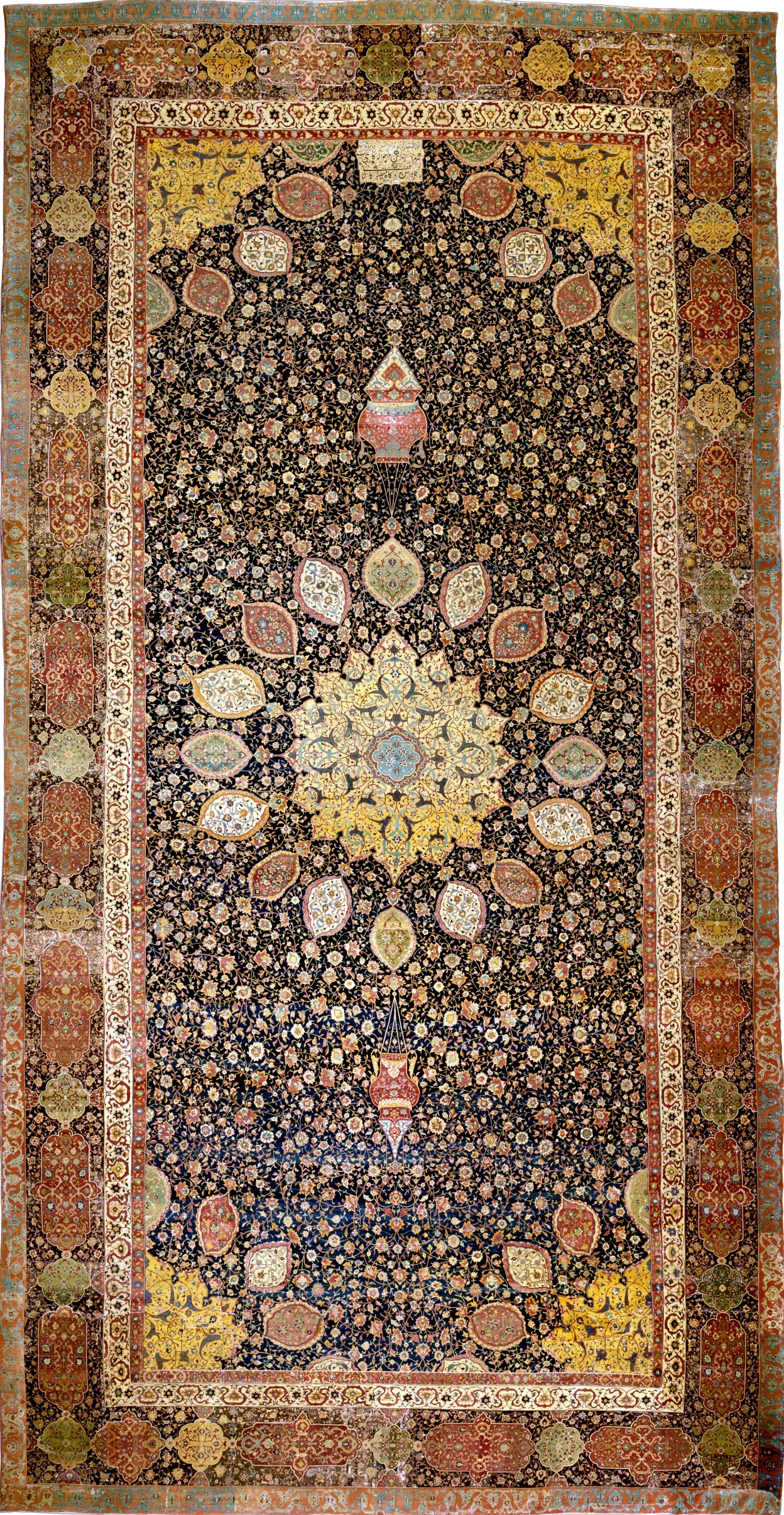 The Ardabil Carpet (1539–40), commissioned for the shrine of Safi al-Din — V&A Museum, London.