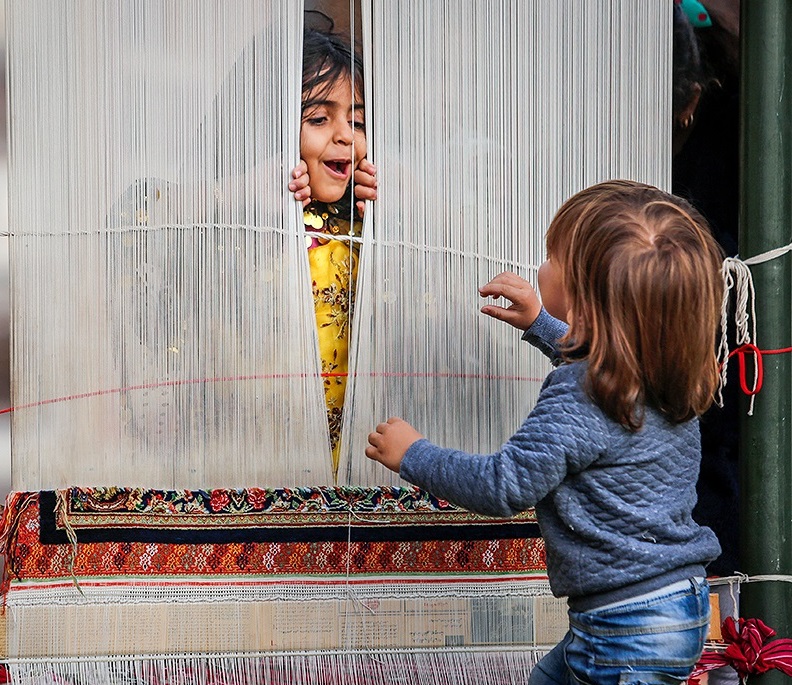 A Gabbeh from Shiraz — Qashqai tribal carpet with coarse pile and saturated dyes.