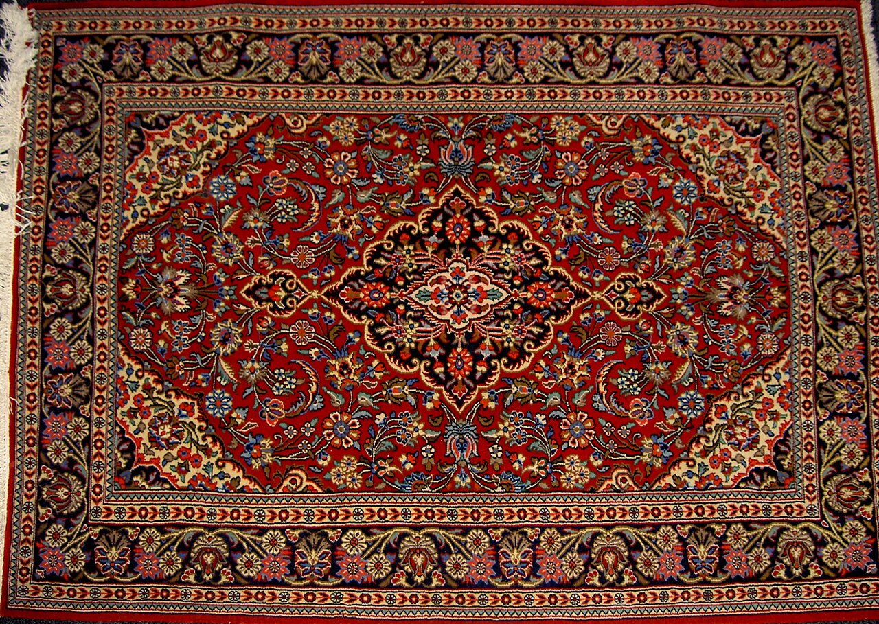 A pure-silk Qom rug at 1,000+ KPSI — modern fine work in the Safavid tradition.