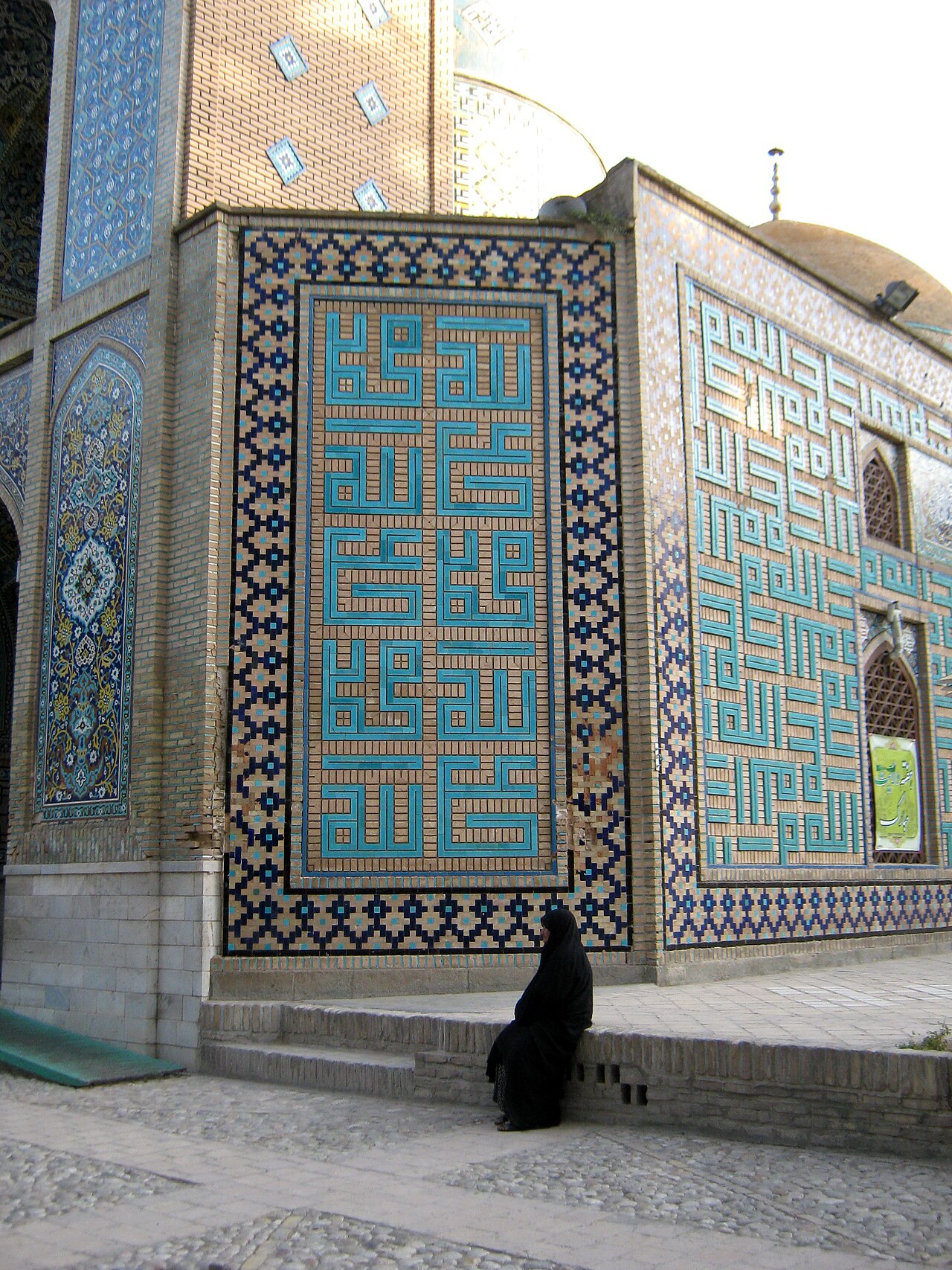 Square (banna'i) Kufic — Allah, Muhammad, Ali — set into Safavid tilework.